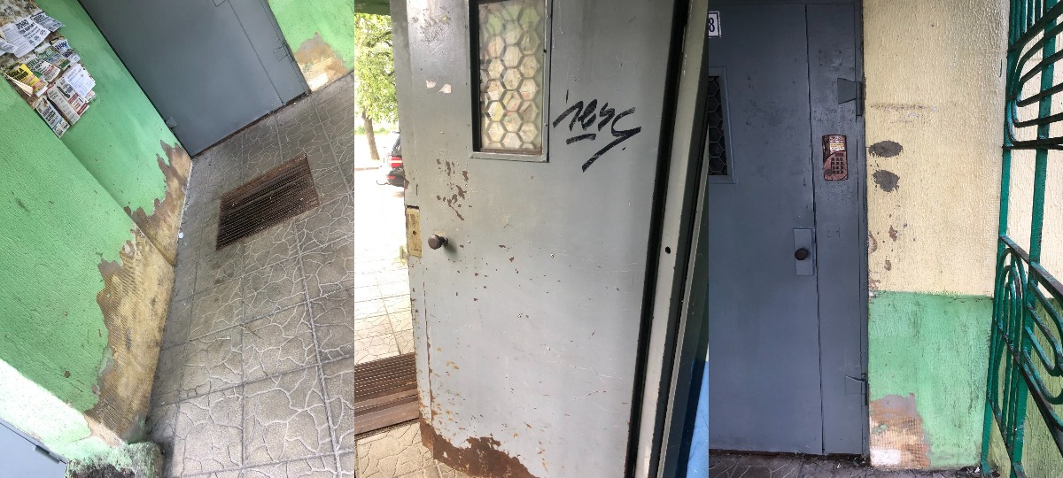 подъезд с облезлой краской на стенах